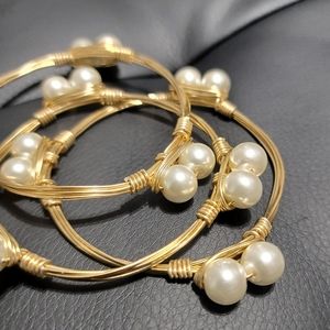 Beautiful Goldtone and pearl wire Bracelet set.